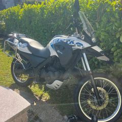 Motorbike with helmit, 2 jackets, gloves and lock.