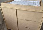 Kub Madera baby changing table and storage.