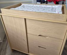 Kub Madera baby changing table and storage.