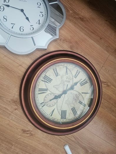 Two large clocks, working but time not accurate, might be an easy fix