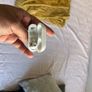 AirPods Pro right hearing piece and case. Image 2