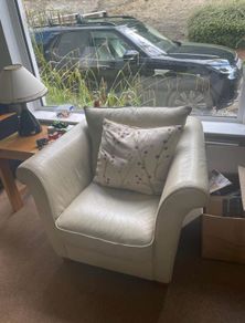 Natuzzi cream leather three seater sofa and two arm chairs