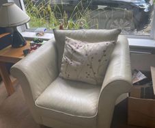 Natuzzi cream leather three seater sofa and two arm chairs