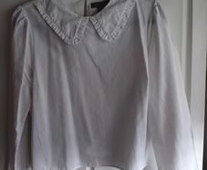 White Blouse with Peter Pan collar.