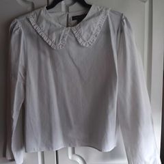 White Blouse with Peter Pan collar.