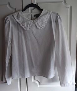 White Blouse with Peter Pan collar.
