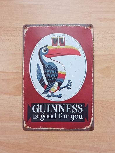 Guinness reproduction metal sign featuring the iconic toucan mascot  size 20x30cm