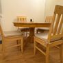 Round solid pine dining table with 5 chairs Image 3