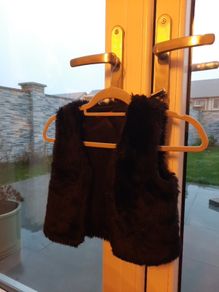 Black waistcoat size 8-9 years