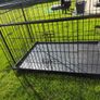 XL dog crate opens up by sliding doors at front and side. Read caption Image 4