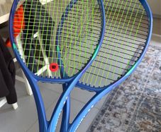 Pair of Yonex EZONE 100 tennis rackets