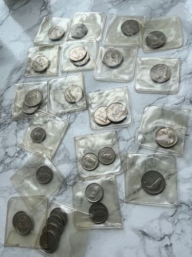 Irish decimal 5p coins x 28 & 10p coins x 2. Two for 1 euro. Ten euro the lot. Dates below
