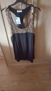 Ladies black & gold sequin top