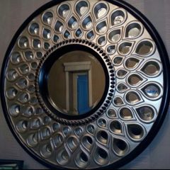 round ornate mirror