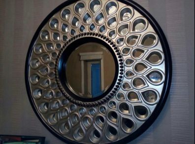 round ornate mirror