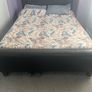 king size bed with black leather head board Image 3