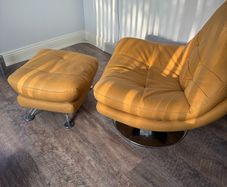 Swivel armchairs with footstool