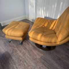 Swivel armchairs with footstool