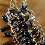 New Necklace with gold coloured with black stones and rope detail Image 2
