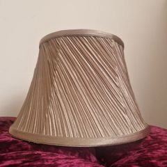 Shiny, rich golden table lamp shade