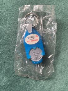 vintage brand new Texoil key ring and trolley coin