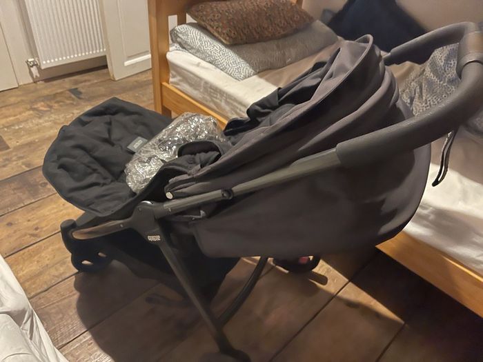 buggy with rain cover & foot muffins