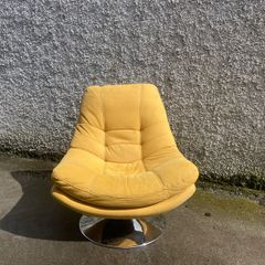 Yellow swivel chair