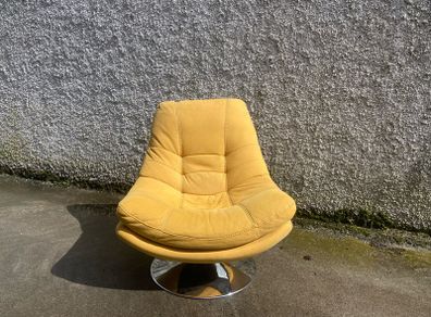 Yellow swivel chair