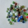 Jar of assorted marbles, Marbles. Image 2
