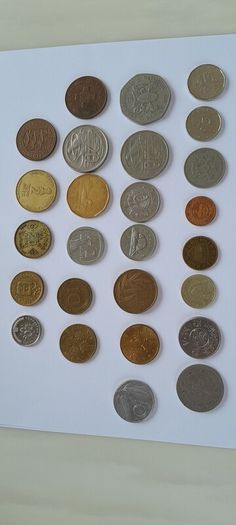 Coins a mix of different countries 28 coins in total registered post included
