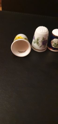 Collection of Flower Themed Gold Coloured Edged Thimbles