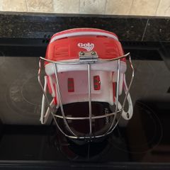 Red Gola hurling helmet