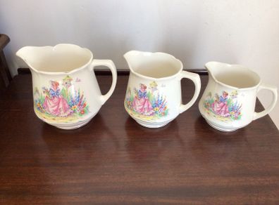 Vintage Edwardian Lady in flower garden set of three graduating  water jugs