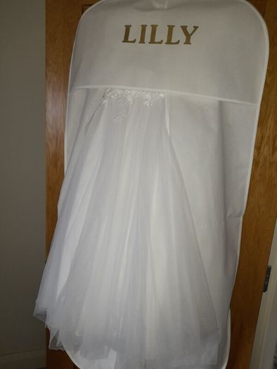 communion dress and umbrella