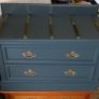 Chest drawers with brass strip suitcase set down Image 4