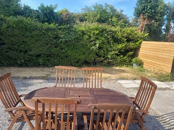 Teak Garden extending table and 6 reclining armchairs