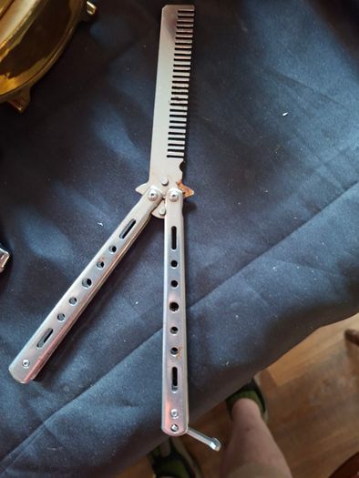 Old Penknife and Steel Butterfly Comb for sale as a lot