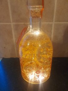 New unopened  Clenmentine liqueur Gin in date light up snow globe bottle