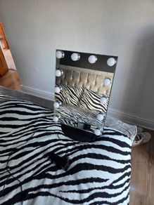 glam doll mirror