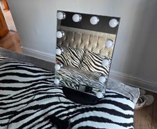 glam doll mirror