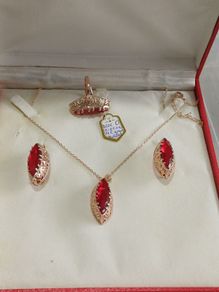 A Three-Piece Vintage Style 14K Gold Rolled Zircon Jewelry Set