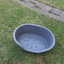 Small plastic dog bed. Image 4