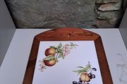 Vintage wooden cheese board with tile