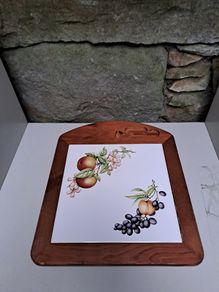 Vintage wooden cheese board with tile