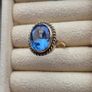 Beautiful 9K gold ring featuring a stunning large oval blue stone. Image 3