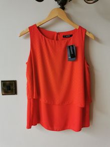 Orange/red sleeveless top