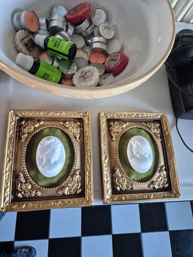 A pair of MidCentury Kelgin wall hanging Plaster  Vintage decorative pair of wall plaques featuring plaster cameos on green velvet background with ornate gold relief plaster frames