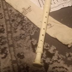Suzuki recorder with canvas case and music note sheet