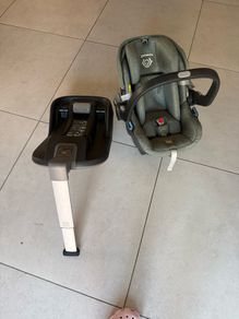 This is an UPPAbaby Mesa i-Size Infant Car Seat in a green-toned fabric.