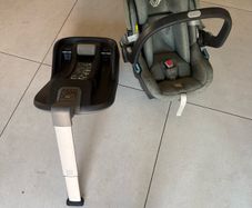 This is an UPPAbaby Mesa i-Size Infant Car Seat in a green-toned fabric.